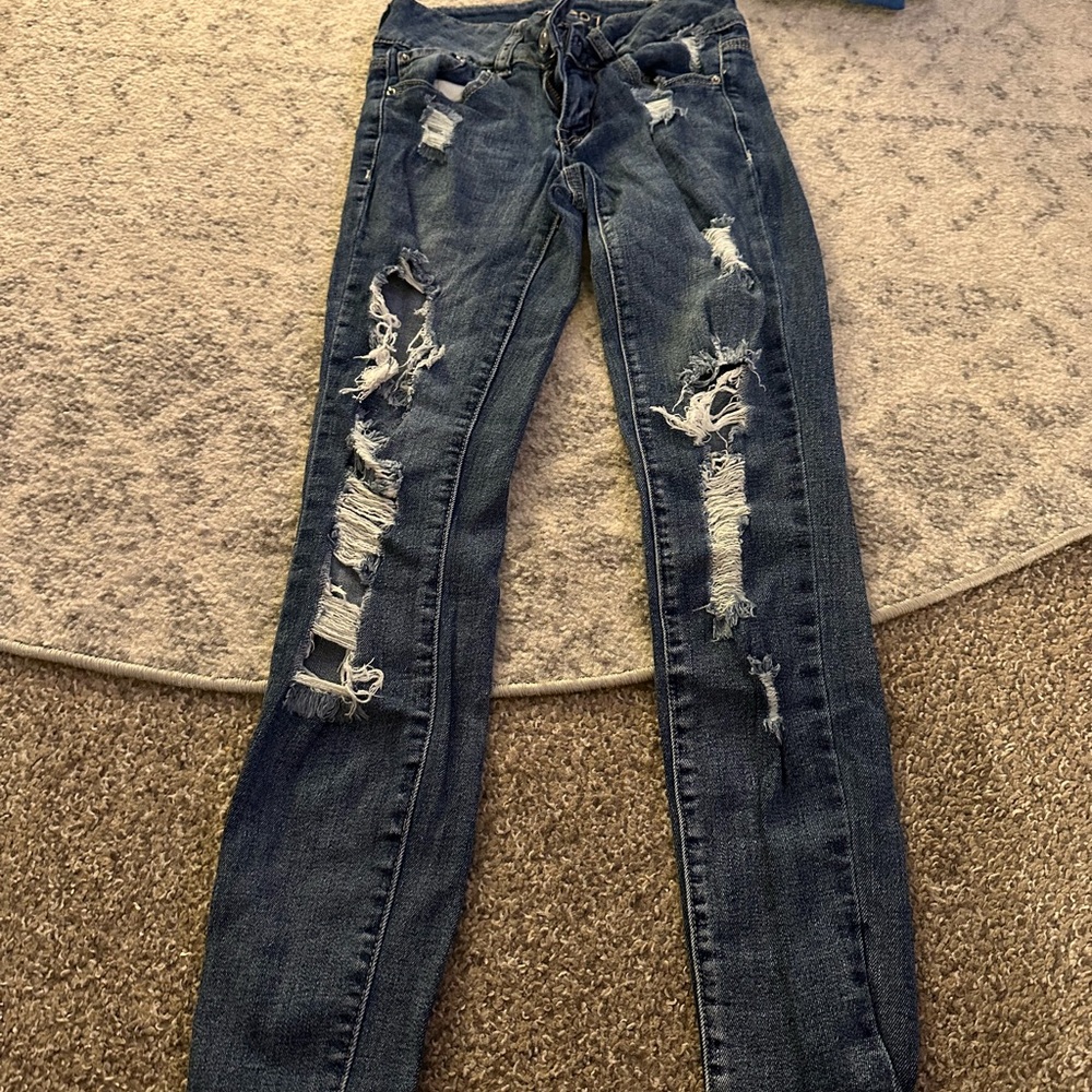 Distressed Blue Jeans